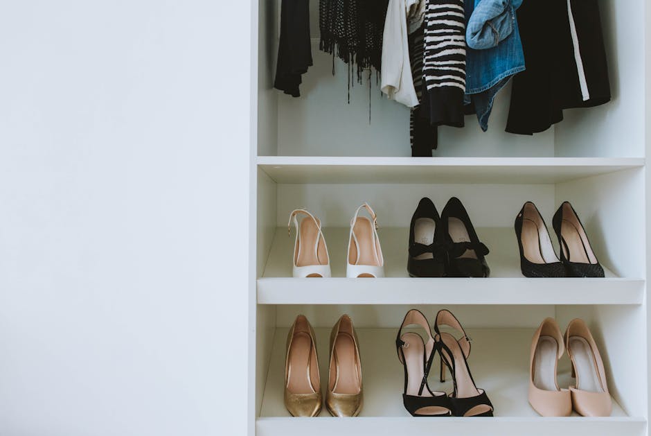 Organized shoe display shelves in custom closet