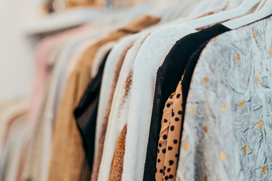 Clothes hanging neatly on a custom rack